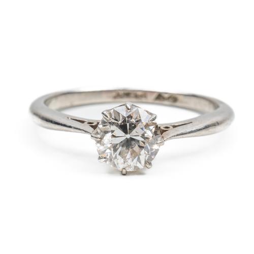 A PLATINUM AND DIAMOND SINGLE STONE RING