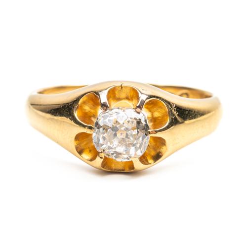 AN 18CT GOLD AND DIAMOND SINGLE STONE RING
