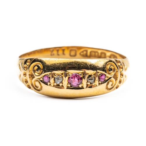 AN 18CT GOLD RUBY AND DIAMOND FIVE STONE RING