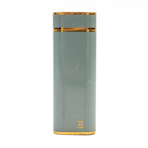 A CARTIER PARIS GILT METAL AND GREY LACQUERED GAS LIGHTER