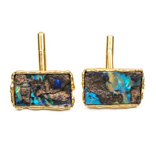 A PAIR OF 18CT GOLD AND OPAL CUFFLINKS