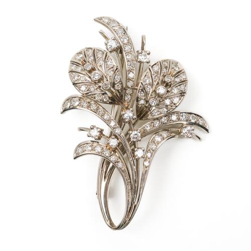 A DIAMOND SET SPRAY BROOCH