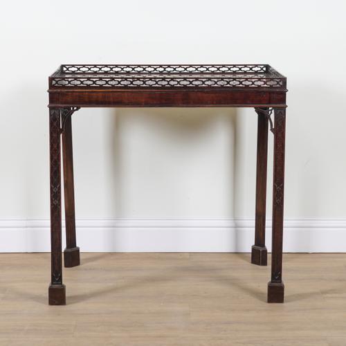 A LATE GEORGE III MAHOGANY GALLERIED SILVER TABLE