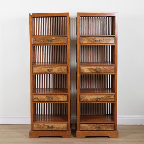 A PAIR OF WALNUT AND HARDWOOD FLOORSTANDING OPEN BOOKCASES (2)