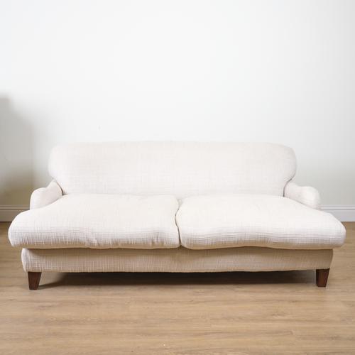 A 20TH CENTURY WHITE UPHOLSTERED TWO SEAT SOFA