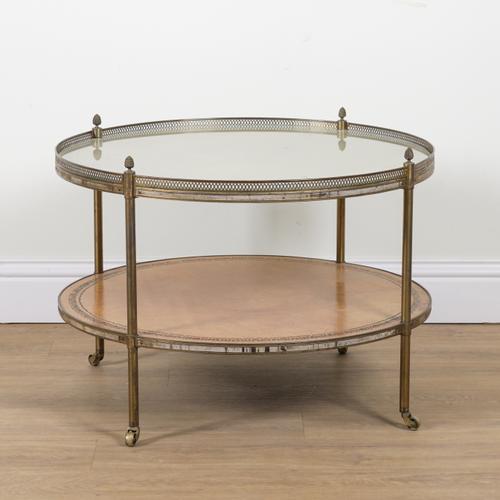 IN THE MANNER OF MALLETTS; AN EARLY 20TH CENTURY LACQUERED BRASS LEATHER INSET TWO TIER ETAGERE