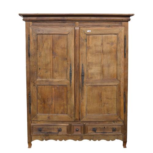 A 19TH CENTURY FRENCH OAK TWO DOOR ARMOIRE