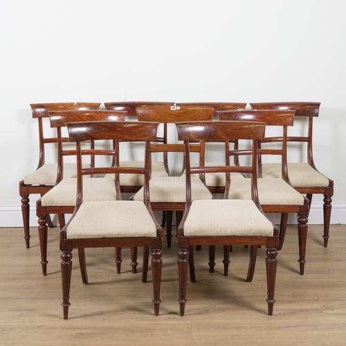 A SET OF EIGHT REGENCY MAHOGANY BAR BACK DINING CHAIRS (9)
