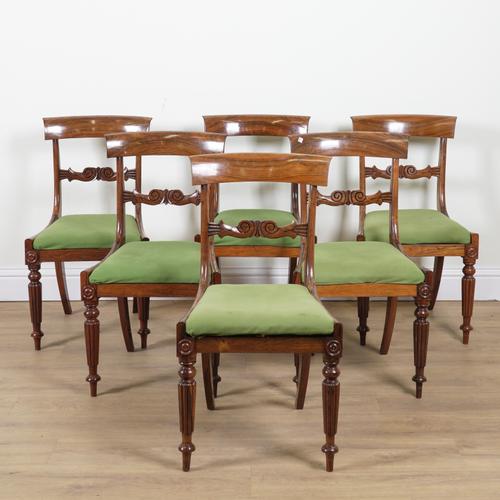 A SET OF SIX REGENCY ROSEWOOD DINING CHAIRS (6)