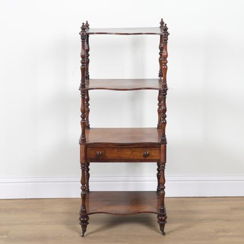 A VICTORIAN ROSEWOOD SERPENTINE FRONTED FOUR TIER WHAT-NOT