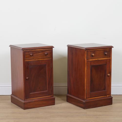 A PAIR OF MAHOGANY BED SIDE TABLES (2)