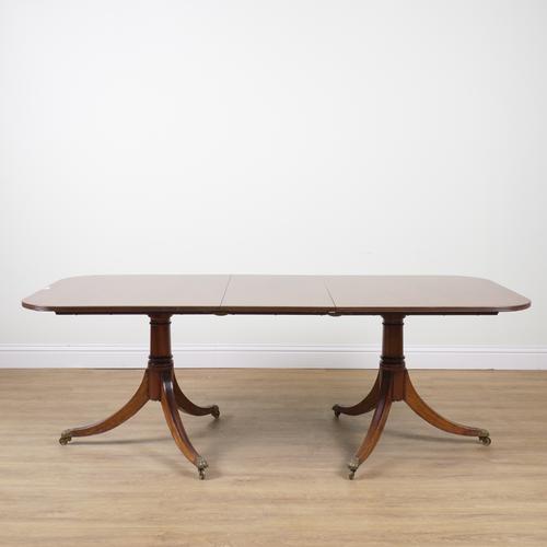 A GEORGE III STYLE MAHOGANY D-END EXTENDING DINING TABLE