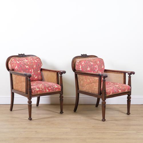 A PAIR OF MID 20TH CENTURY TEAK FRAMED ARMCHAIRS (2)