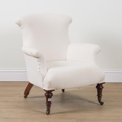 A VICTORIAN MAHOGANY FRAMED EASY ARMCHAIR
