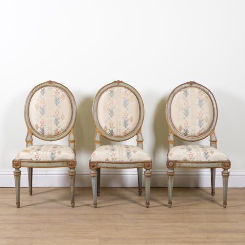 A SET OF THREE LOUIS XVI BLUE PAINTED PARCEL GILT SIDE CHAIRS (3)