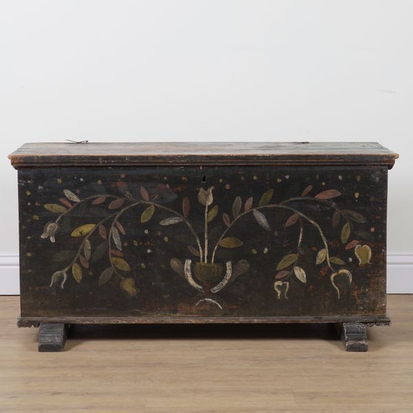 A 19TH CENTURY NORTH EUROPEAN POLYCHROME PAINTED RECTANGULAR LIFT TOP TRUNK
