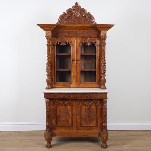 A 19TH CENTURY FRENCH CARVED WALNUT DRESSER