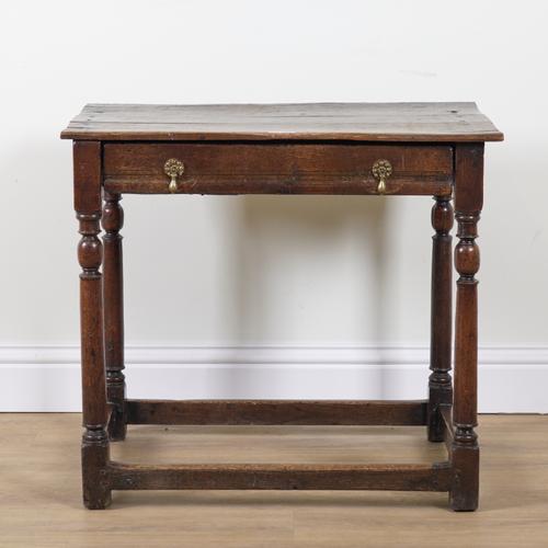 A 17TH CENTURY OAK SINGLE DRAWER SIDE TABLE