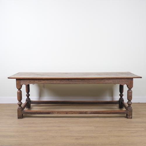 A 17TH CENTURY AND LATER OAK PLANK TOP REFECTORY TABLE