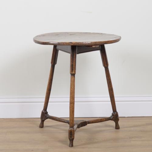 A GEORGE III ELM TOPPED CRICKET TABLE