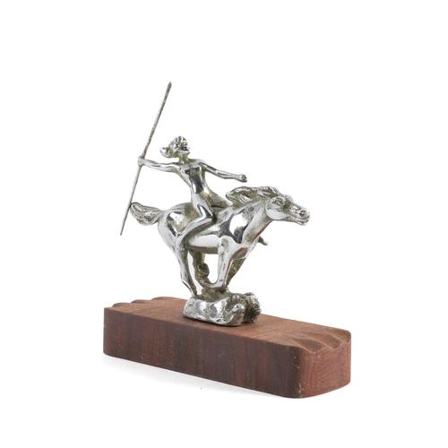 A CHROME CAR MASCOT OF A WARRIOR WOMAN ON HORSEBACK WITH SPEAR