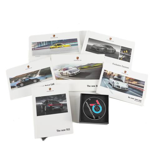 A PORSCHE 70TH ANNIVERSARY CAR BADGE AND FIVE BOOKS (6)