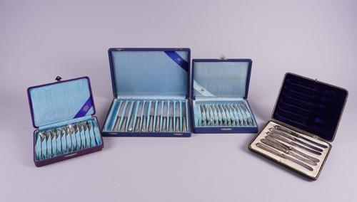 FOUR CASES OF FLATWARE (4)