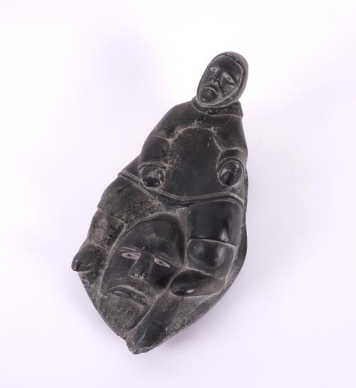 JOS HPIE: AN INUIT CANADIAN CARVED STONE FIGURE OF AN INUIT AND MASK