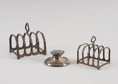 TWO SILVER TOASTRACKS AND AN INKSTAND (3)
