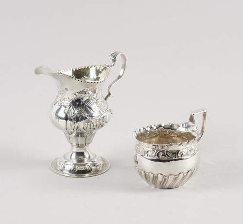 TWO SILVER CREAM JUGS (2)