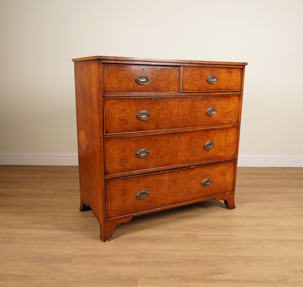 A GEORGE III LATER POLLARD OAK VENEERED FIVE DRAWER CHEST