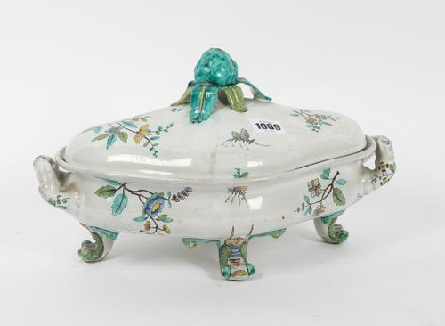 A CONTINTENTAL FAIENCE TWO-HANDLED QUATREFOIL AND COVER (2)