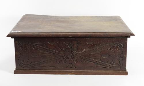 A 17TH CENTURY CARVED OAK BIBLE BOX