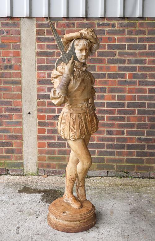 A FRENCH CAST IRON PAINTED FIGURE OF A STANDING COURTIER