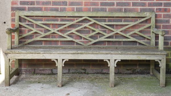 A PAIR OF HARDWOOD GARDEN BENCHES (2)