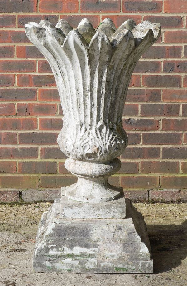 A WHITE PAINTED RECONSTITUTED STONE JARDINIERE