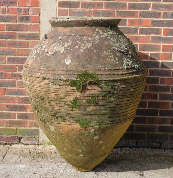 A LARGE TERRACOTTA OIL JAR