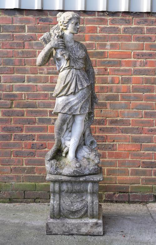 ITALGARDEN; A WHITE PAINTED RECONSTITUTED STONE FIGURE OF DIANA THE HUNTRESS