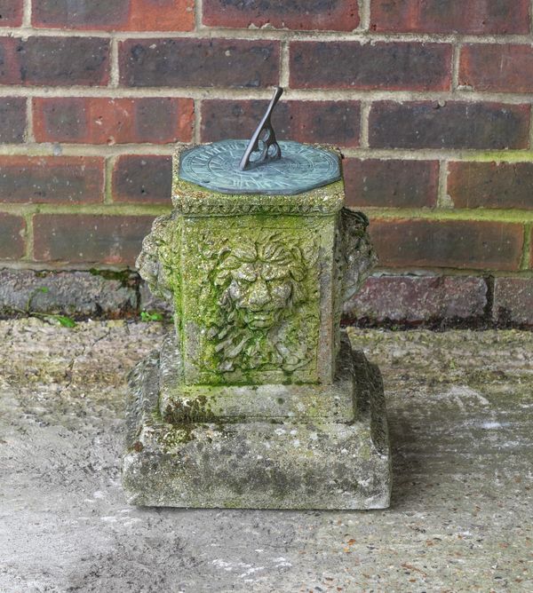 A RECONSTITUTED STONE SUN DIAL