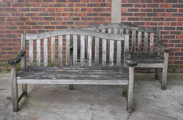 A PAIR OF HARDWOOD GARDEN BENCHES (2)