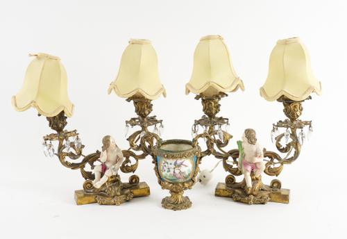 A FRENCH PORCELAIN GILT-METAL MOUNTED TWIN HANDLED URN (3)