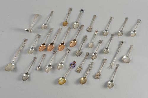 A GROUP OF MOSTLY SILVER SPOONS AND A FEW FURTHER ITEMS