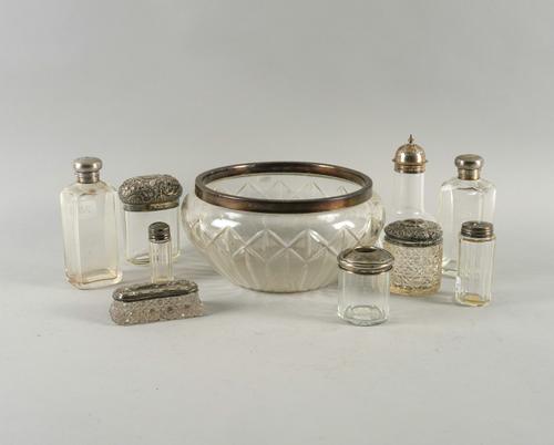 A SILVER RIMMED FACETED GLASS SALAD BOWL AND NINE FURTHER SILVER MOUNTED GLASS ITEMS (10)