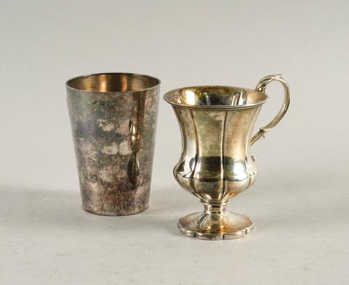 A VICTORIAN SILVER CHRISTENING MUG AND A SILVER BEAKER (2)