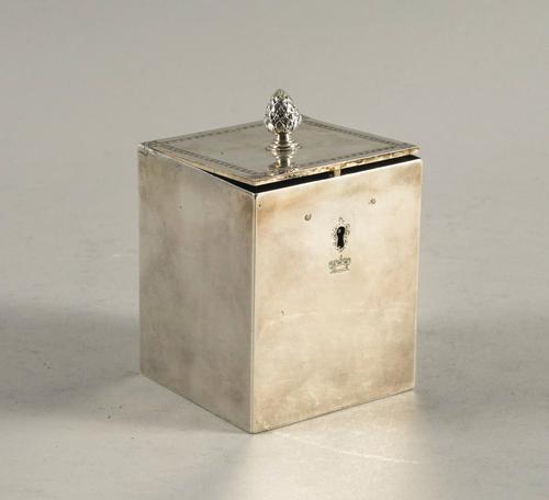 A GEORGE III SILVER TEA CADDY