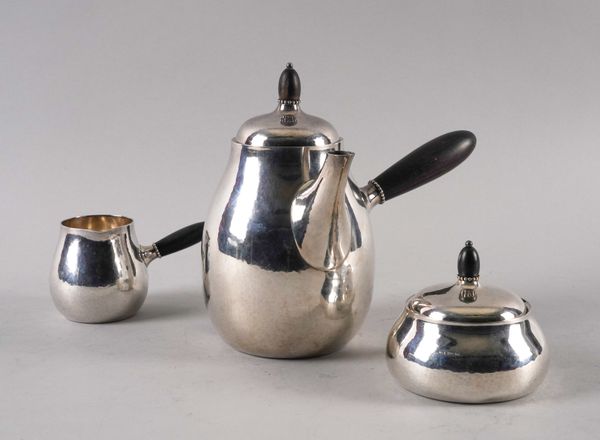 A GEORG JENSEN SILVER THREE PIECE COFFEE SET (3)