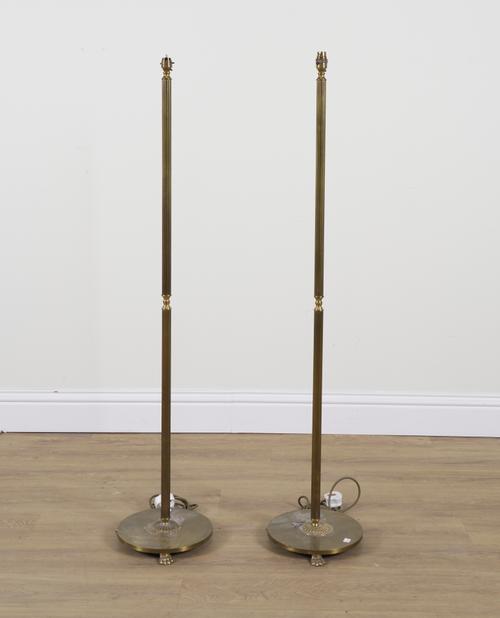 A PAIR OF BRASS FLUTED FLOOR STANDING LIGHTS (2)