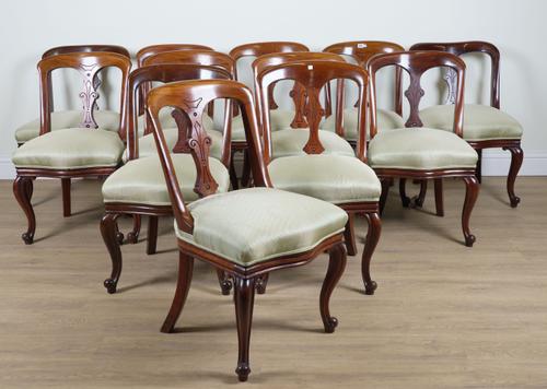 A SET OF TWELVE MAHOGANY TUB BACK DINING CHAIRS (12)