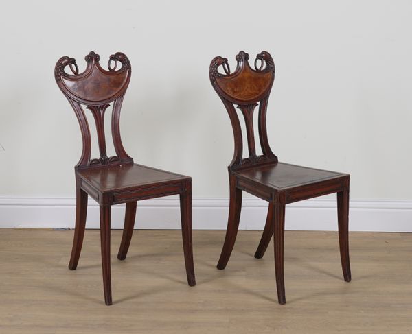 A PAIR OF GEORGE III MAHOGANY HALL CHAIRS (2)