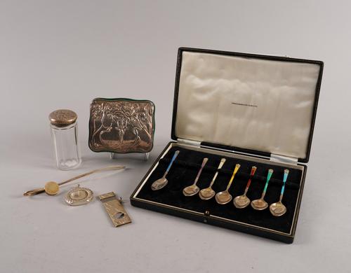 A PART SET OF SEVEN SILVER AND ENAMELLED COFFEE SPOONS AND FIVE FURTHER ITEMS (6)